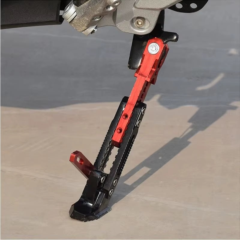 Motorcycle with adjustable kickstand in action on uneven ground