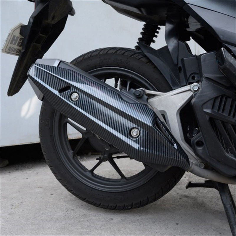 Side profile of a Honda Vario Click 125 with the Motocircuit exhaust protector, enhancing bike's style and safety.